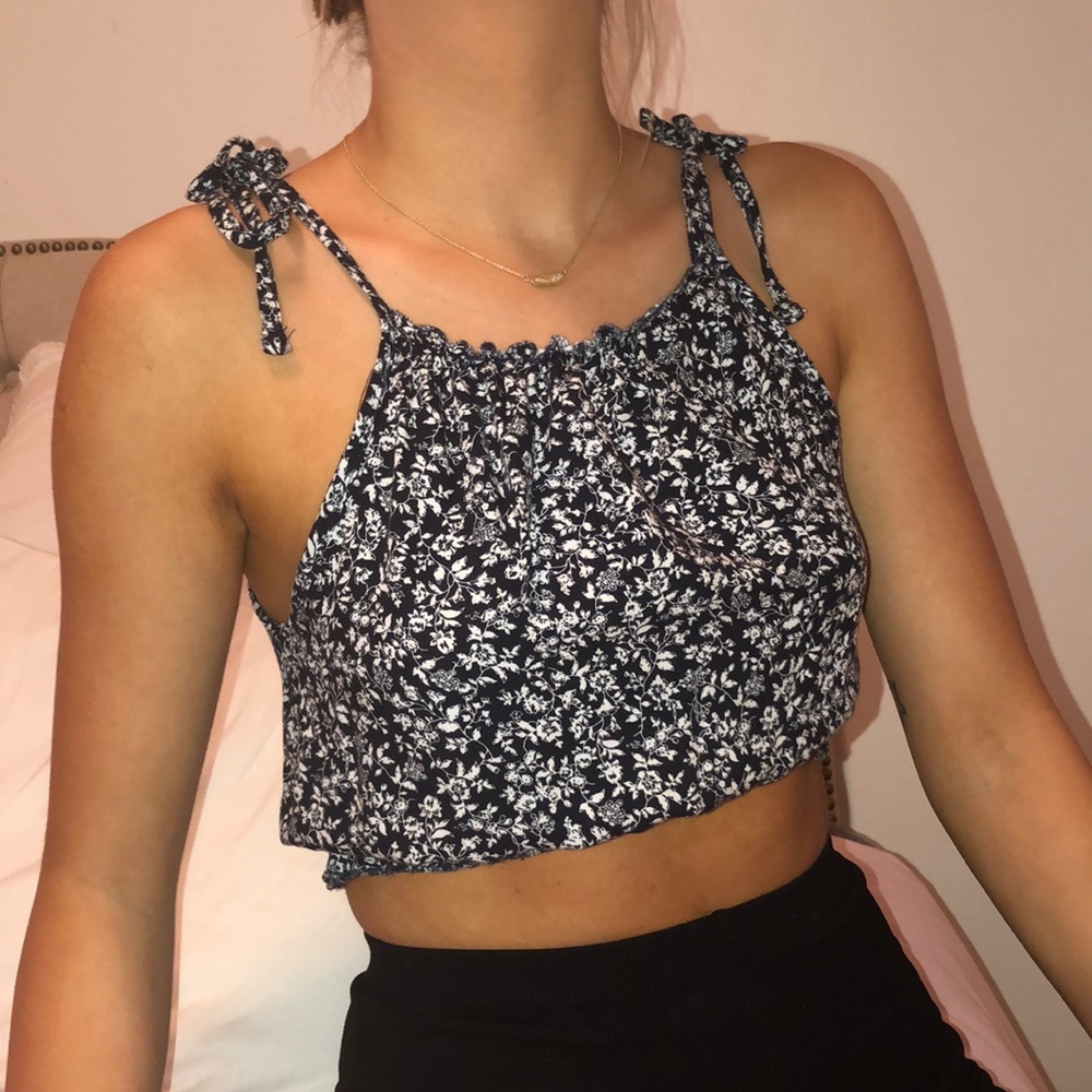 Floral brandy melville shirt ties on top